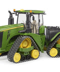 Side view of John Deere 9620RX Track Belts Tractor Toy Realistic 1 To 16 Scale German Made ABS Plastic with crawler drive.