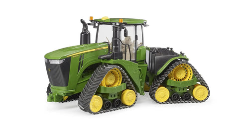 Side view of John Deere 9620RX Track Belts Tractor Toy Realistic 1 To 16 Scale German Made ABS Plastic with crawler drive.