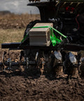 ATV pulling disc plow harrow with weight tray, 54-inch width, eight notched discs. Product: Disc Plow Harrow With Weight Tray For ATV UTV And Garden Tractors For Heavy Duty Soil Prep Weed Control And Crop Residue Clearance Built Tough For Real Dirt Work That Feels Like A Beast And Cuts Through Tough Weeds.