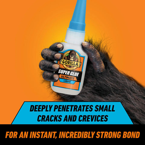 Ultimate Clear Super Glue 15 Grams Heavy Duty Fast Set Bond For Quick Fixes And Home Repairs With Anti Clog Cap Cyanoacrylate Adhesive For All Purpose Use bottle held by a hairy hand against an orange background.
