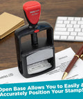 Top Shelf Heavy Duty Self Inking Date Stamp With Crisp Red Ink Lightweight Build Finger Guard Shell One Point Five By Two Point Twenty Five Impressions Snappy Quick Reload Setup on paperwork.