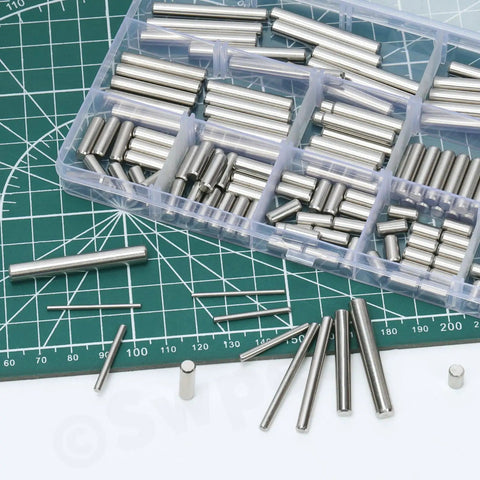 Boss Level 304 Stainless Steel Dowel Pin Assortment Featuring 180 Pieces Across Nine Sizes on green mat, showing varying lengths.