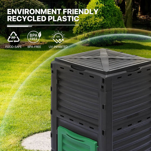 80 Gallon Large BPA Free Outdoor Compost Bin With Rotating Chamber And Sliding Door in garden setting