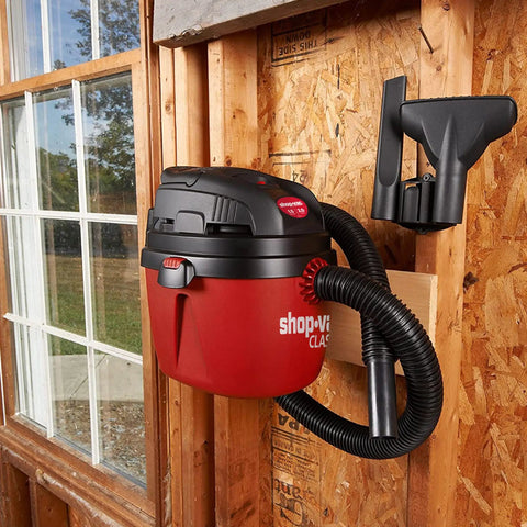 1.5 Gallon 2.0 Peak Wet Dry Vacuum For Quick Cleanups At Home, Garage, Or Vehicle, mounted on wall in garage