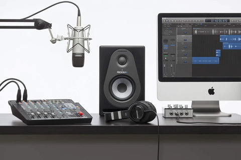 Dope Studio Condenser Recording Microphone With Large 19mm Diaphragm, Cardioid Pickup on a boom arm in home studio setup