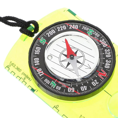 Close-up of Portable Acrylic Hiking Compass For Outdoor Camping And Backpacking, showing the dial and red needle on acrylic base.