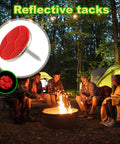 High Visibility Trail Marker Tacks Set 50 Reflective Metal Tacks beside campers at night