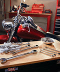 11 Piece SAE Ratcheting Wrench Set with 72 Tooth Box End, chrome finish, on workbench with motorcycle in garage setting.