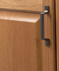 Solid Core Cabinet Pulls for Kitchen and Dresser Doors Richmond Collection Oil Rubbed Bronze Highlighted Bar Pulls With Three Inch Center To Center Four And Nine Sixteenths Inches Long Luxury Hardware For Contemporary And Traditional Includes Mounting installed on wooden cabinet door