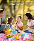 Family picnic with 100 Disposable Popcorn Bags 1oz Paper Bags For Popcorn And Kernels Mini Containers on a red blanket
