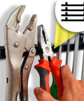 Hand placing pliers on 12 Inch Heavy Duty Magnetic Tool Holders 4 Pack 48 Inches Total Length Upgraded Strong Magnets That Never Lose Grip.
