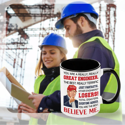Engineer Mug 11 Oz For Men And Women Ceramic Coffee Cup Gift For Engineers On Christmas Father's Day Mother's Day Birthday Totally Boss Gift For Mechanical Civil Electrical Software Pros, shown with engineers in background.