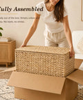 Handwoven Water Hyacinth Storage Trunk With Lid And Handles being unboxed, rustic wicker storage chest, eco friendly boho decor