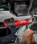 Mechanic using M12 Fuel Half Inch Right Angle Impact Wrench Kit With Powerstate Brushless Motor Delivers Up To 298 Nm Of Torque