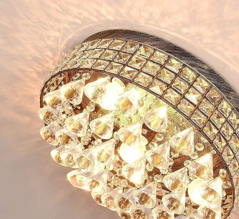 Close-up of 4 Light Traditional Crystal Chandelier In Bronze Drum Ceiling Light Fixture With Round Metal Shade And Raindrop Crystals