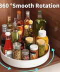 Large Capacity Lazy Susan Organizer For Pantry Cabinet And Kitchen Storage Featuring Super Slick 360 Spinner Turntable Spice Rack with various bottles in a white rotating organizer.