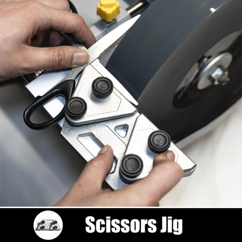 Pro Grade Sharpening Gear Kit For Wet Sharpening System With Long Knife Jig Short Knife Jig Axe Jig And Scissors Jig Compatible With Tormek Wen Bucktool Jet And Bench Grinders in use with scissors jig on sharpener