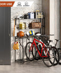 4 Bike Stand Slick Garage Organizer With 3 Tier Storage Rack For Indoor Bike Storage Fits Road Mountain Hybrid And Fat Tire Bikes With Adjustable Slots From Narrow To Wide shown holding bikes and sports gear