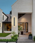 Totally Sleek Modern Outdoor Wall Light With 24W LED At 3000K Warm White on house exterior wall
