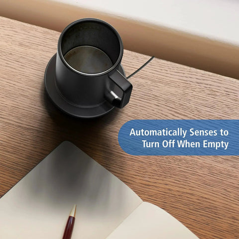 Premium Self Heating Rechargeable Coffee Mug With Precise Temperature Control And A Leak Proof Lid on a wooden desk, sensing when empty.