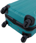 Travelers Club Chicago teal hardside expandable spinner luggage, 22-inch carry-on; bottom view with four wheels.