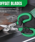 Beefy 10 Inch Bent Compound Action Tin Snips With Drop Forged Blades cutting sheet metal, ergonomic green handles visible