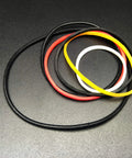 Colorful rubber bands from 82 Piece Plastic Gear Kit For DIY Toy Cars And Robots Complete Gear Pack with pulleys and belts.