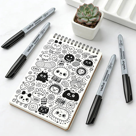Bulk Black Permanent Markers 150 Pack With Fine Point Tips For Office And Moving shown with doodles on a notebook