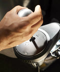 Hand gripping the gear lever of Next Level All Metal H Pattern And Sequential Sim Racing Shifter With Real Hall Effect Sensors For Plug And Play Setup And Ridiculously Smooth Shifts On Ps5 Xbox Pc.