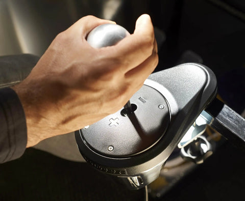 Hand gripping the gear lever of Next Level All Metal H Pattern And Sequential Sim Racing Shifter With Real Hall Effect Sensors For Plug And Play Setup And Ridiculously Smooth Shifts On Ps5 Xbox Pc.
