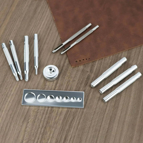 All In One Craft Tool Die Punch Snap Kit Rivet Setter With Base For DIY Projects on wooden surface and brown leather mat