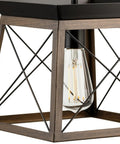 Close-up of Coastal 1-Light Mini Pendant in Antique Bronze for Rustic Farmhouse Vibe, featuring open cage and bulb.