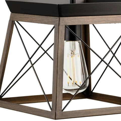 Close-up of Coastal 1-Light Mini Pendant in Antique Bronze for Rustic Farmhouse Vibe, featuring open cage and bulb.