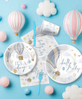 Blue Hot Air Balloon Baby Shower Tableware Set with plates, cups, cutlery on cloud-themed surface for boy, 24 serves, Adventure Awaits.