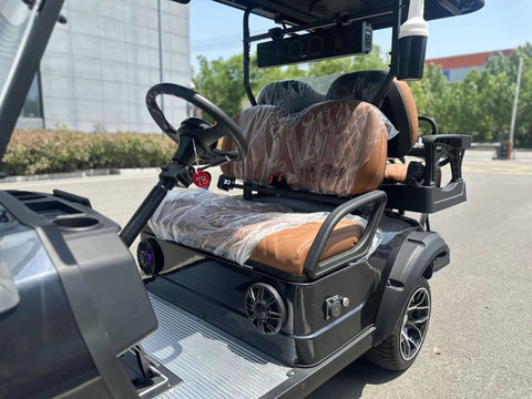 Premium Four Seater Electric Golf Cart with spacious gray interior and digital controls, ideal for smooth all terrain rides.