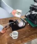 Man using 3 Pack Silicone Mug Clamp For 15 Oz Cups 3D Sublimation Cup Wrap Fixture For Printing Heat Transfer Machine