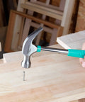 8 Oz Claw Hammer With Shock Reduction And Non Slip Grip Turquoise Handle For Home And Professional Use Durable Steel Construction Flat Head With Nail Puller And Prying Claw Comfort Grip That Reduces Vibration For Less Fatigue used for nailing.