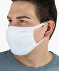 Person wearing Reusable Cotton Face Mask Pack Of 50 White Unisex One Size Fits Most 3 Ply With Silver Threads Washable