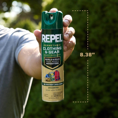 Person holding 6.5 oz Permethrin Clothing And Gear Insect Repellent Spray For Nets Tents Sleeping Bags And Backpacks outdoors