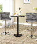 Velvet Swivel Bar Stools Set of 2 Modern Counter Height Chairs With High Backrest Adjustable Barstools in kitchen setting.