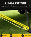 Heavy-Duty I-Beam Mount Stabilizer for RVs and Trailers, shown in use with yellow ratchet strap on grass for stability