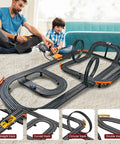 Father and son playing with Slot Car Race Track Set with 4 high-speed cars and 2 hand controllers, indoor play setup shown.