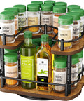 Two Tier In Cabinet Spice Rack Organizer With Rotating Lazy Susan No Brainer Space Saver For 11 Inch Wide Cabinets, filled with spices.
