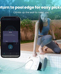 Woman using Hydro 4 Inground Pool Vacuum Cleaner with 50ft corded cable controlled by smartphone app from pool edge.