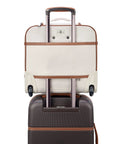Chatelet Softside Underseat Carry On Luggage With Two Wheels Angora Ecofriendly Recycled Fabric Attached to Dark Suitcase