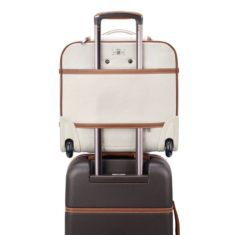 Chatelet Softside Underseat Carry On Luggage With Two Wheels Angora Ecofriendly Recycled Fabric Attached to Dark Suitcase