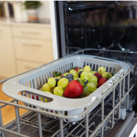 Gray basket with grapes and strawberries in a Straight Plug Countertop Dishwasher With No Fuss Setup And Lightning Fast Fifteen Minute Cycle.