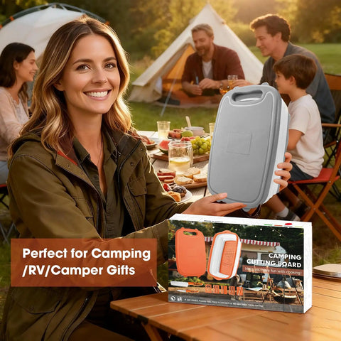 Person holding 9 in 1 Collapsible Cutting Board With Colander for camping and outdoor kitchens, RV campers chopping board in gray.