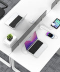 3 Inch Recessed Desk Power Grommet With USB C 65W Fast Charging and Ultra Flat Plug Strip shown on a white desk with laptops and devices.