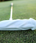 Pro Grade Premium Aluminum Head Putter With Chrome Stepless Shaft Stiff Graphite Build Ergonomic Rubber Grip White Finish High Precision Feel For Consistent Putts On The Green on a golf course close-up